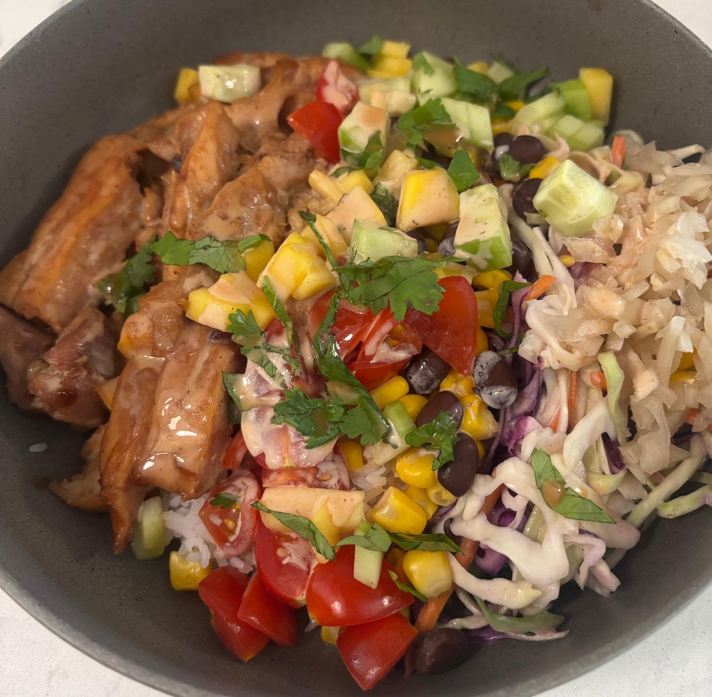 BBQ chicken Bowl with Mango salsa and honey mustard slaw